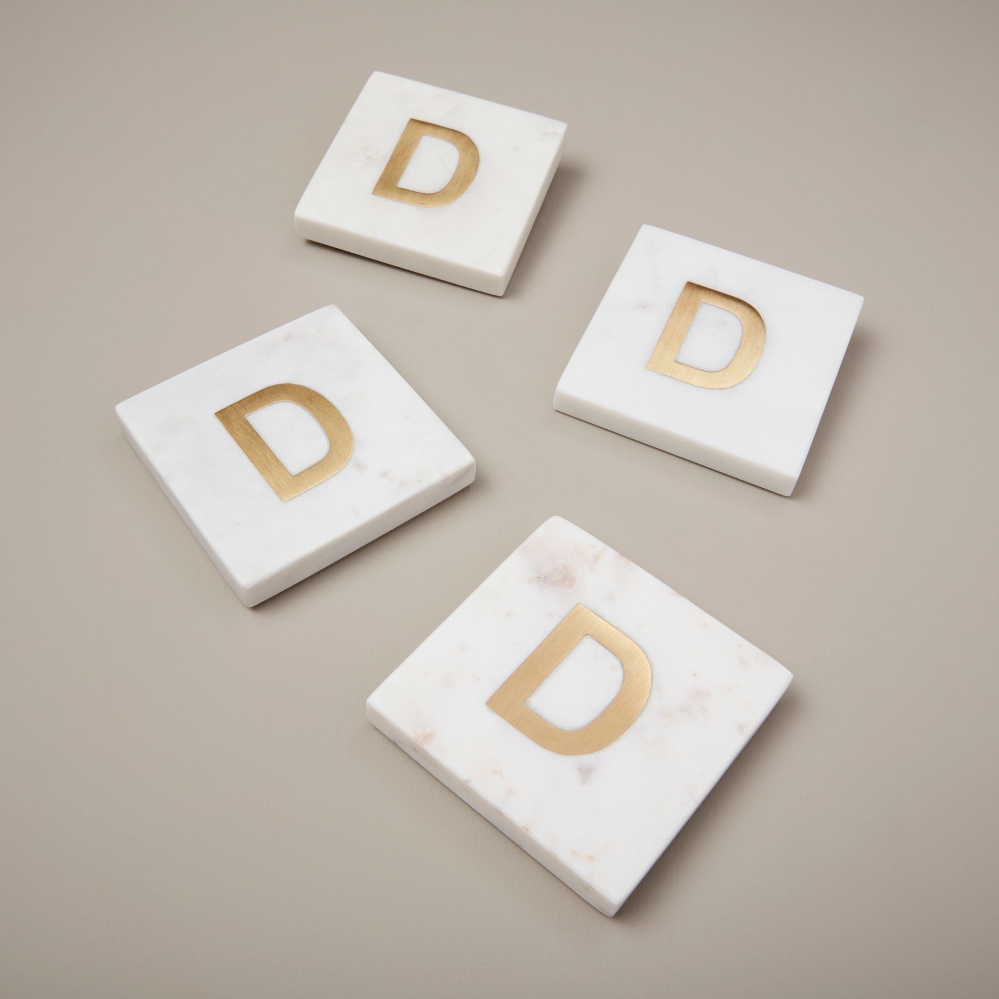 Be-Home_White-Marble-and-Gold-Monogram-Coasters-Set-of-4-D_580-203_09dd5cf0-534f-42d8-90f0-8f0bc9ae1ca4.jpg